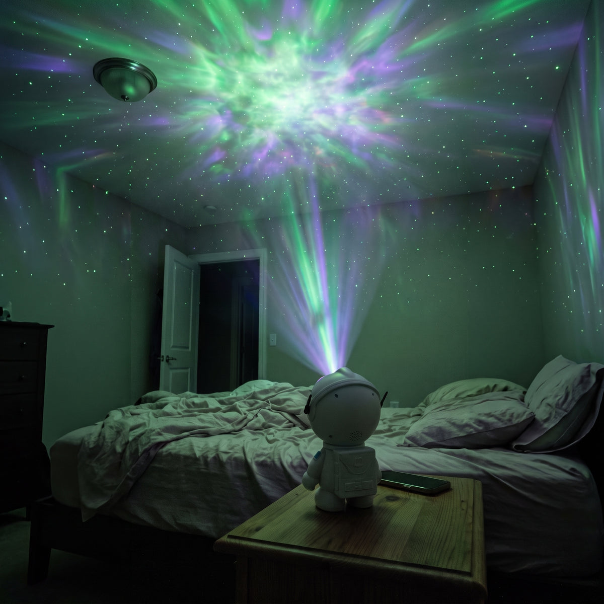 AURALYS Astronaut Galaxy Projector lighting up a bedroom ceiling